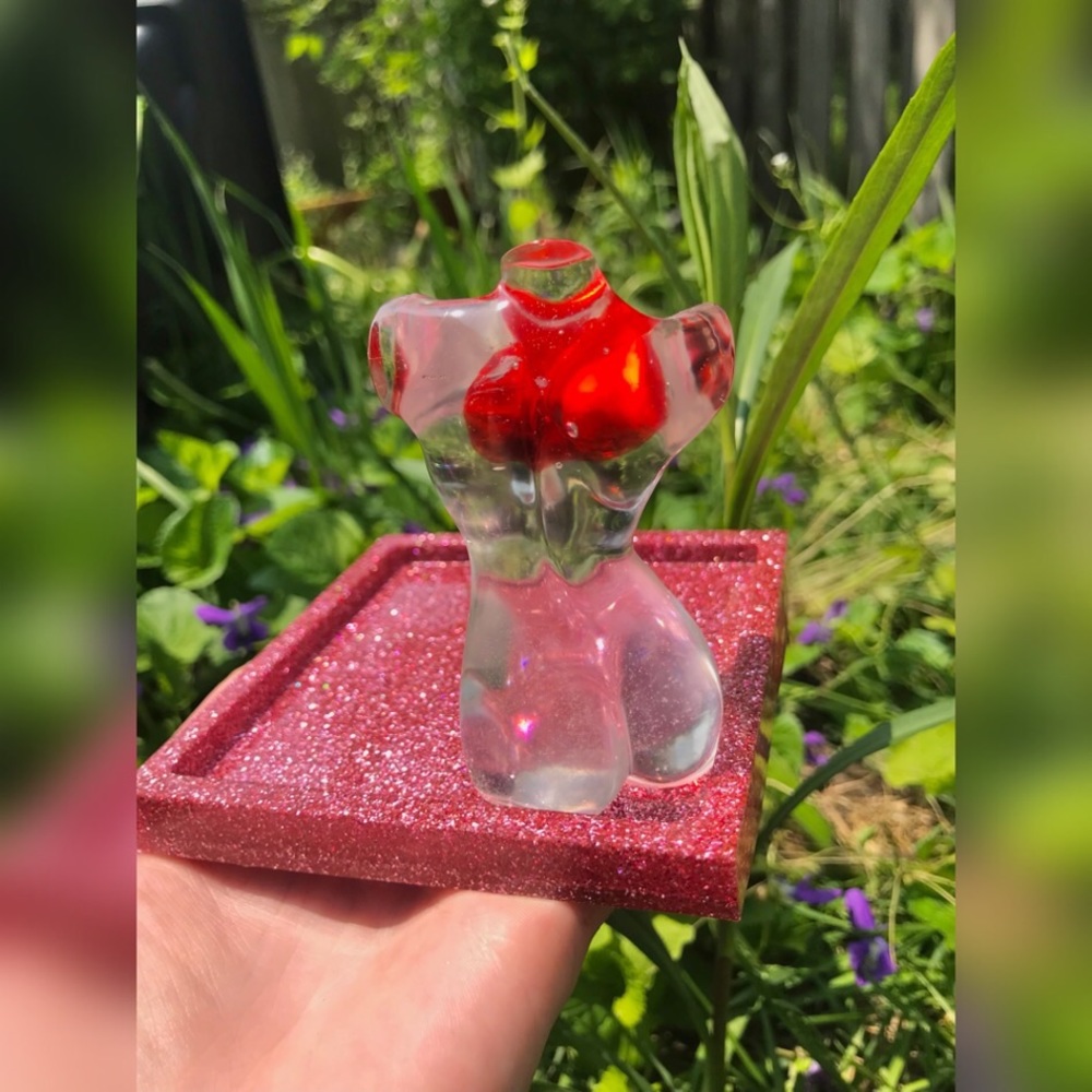 Handmade resin goddess jewelry tray with pink glitter and embedded red h…